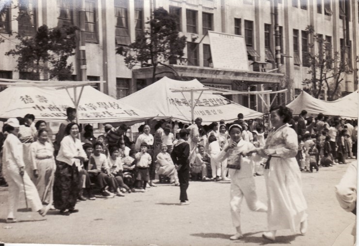 A nostalgic image of a school sports day with colorful bunting.