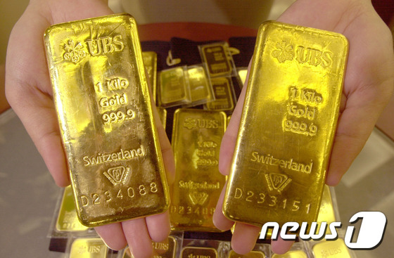 금값, 증시 급락 여파 4거래일 만에 반등..0.2%↑ - 뉴스1