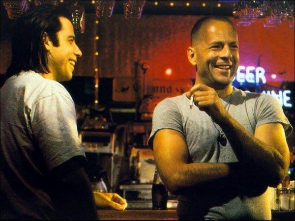 1993 John Travolta and Bruce Willis behind the scenes on the set of Pulp Fiction..jpg
