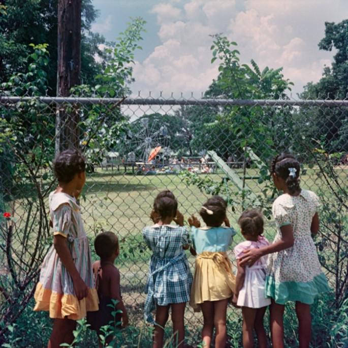 1956 Black children watching as white children play in a whites only park.jpg