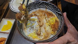 Heuksimdonkkaseu (흑심돈까스) 1