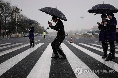 베이징에 내린 첫 눈［AFP=연합뉴스］