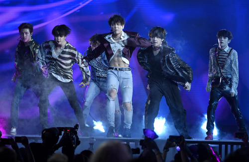 He entered the top spot on the main album chart Billboards 200 with his third album Love Your Self and the top 10 on the main single chart Hot 100 with the title song Fake Love of this album.BTS has been a big fan of entering the top K-pop charts on Billboards main two charts with one album.The Korean singers simultaneous entry of Billboards 200 and Hot 100 was first achieved by BTS in September last year.At the time, he was ranked 7th in the Billboards 200 with Love Yourself, which was released at the time, and won Hot 100 with the title song DNA of this album.This time, both charts have renewed their own records.BTS also set a record for consecutive entry into six albums on Billboards200.Before Love You Self, Hwayang Yeonhwa pt.2 ranked 171, Hwayang Yeonhwa Young Forever ranked 107, Wings ranked 26th, and You Never Work Alon ranked 61st.As a result, attention is focused on how many places BTS will take in the Hot 100. BTS, which ranked 67th with DNA, ranked 28th with a Mike Drop remix released last December.Among the K-pop singers, Hot 100 was the first to enter the group Wonder Girls in 2009 with Nobody.PSY has written a new record as it ranks second in the 2012 Hot 100 for seven consecutive weeks with its Gangnam Style.BTS made its top 10 debut in Hot 100 for the first time in K-pop; the previous record for the charts K-pop debut was 12th, set by PSYs Gentleman in 2013.PSY retweeted a related article on his Twitter account after news emerged that BTS was ranked 10th on the Hot 100.He congratulated BTS by writing Its getting stronger (Stronger) and Proud and more.