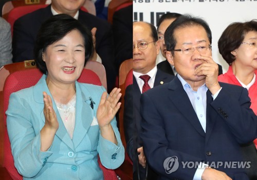 지난 13일 각당 개표상황실에서 제7회 전국동시지방선거 및 국회의원 선거 개표방송을 지켜보는 더불어민주당 추미애 대표(왼쪽)와 자유한국당 홍준표 대표  [연합뉴스 자료사진]