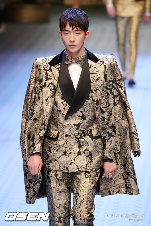 Actor Nam Joo-hyuk has returned to the runway after about three years.Nam Joo-hyuk appeared as Model at the Dolce and Gabbana fashion show in Italy Milan on Wednesday, drawing attention from former World fashion officials.Its been about three years since 2015 that Nam Joo-hyuk has been on the runway as Model.World brand Dolce and Gabbanas Milan Menz Fashion Week 2019 Nam Joo-hyuk, on stage at the spring/summer fashion show, caught the attention of former World fashion officials with Shining visuals and perfect Woking.In the public photos, Nam Joo-hyuk is wearing a gold suit and showing off Models dignity.Shining Nam Joo-hyuks imposing Woking is more eye-catching on the runway.Meanwhile, Nam Joo-hyuk is about to release the movie Anshisung.