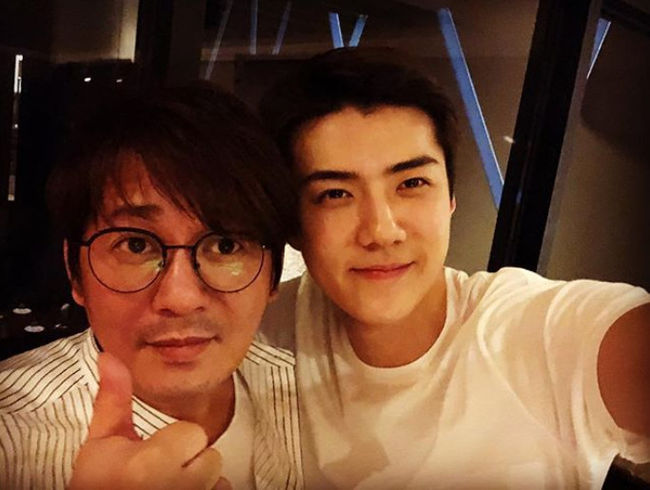 Singer Shin Seung Hun and EXO Sehun showed a warm-hearted senior chemistry.Sehun released a picture on his 24th day with an article entitled Fighting our country! Shin Seung Hun senior.In the public photos, Shin Seung Hun and Sehun are staring at the camera with a friendly pose.It is a reaction that the two people showed their warmth while they were surprised by the unexpected connections of the two people.Judging by the time they posted the article Fighting Our Country and the photo, it seems that the two of them watched South Korea vs. Mexico Kyonggi together.Meanwhile, the 2018 Russia World Cup group stage F Korea and Mexicos Kyonggi, which started at 0 a.m. on the 24th (Korea time), lost 1-2, unfortunately.Sehun Instagram