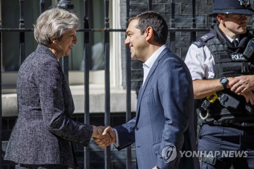26   ȸ ׸ ()  Ѹ ˷ý ġ ׸ Ѹ [AFP=մ]