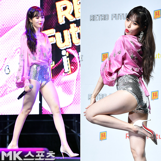 <p>Group Triple H (Hyuna, after) Come back showcase was held at Blue Square Eye Market Hall at Pear Tai Temple in Yongsan-ku, Seoul on the 18th afternoon.</p><p>Triple H releases the second mini album REtro Futurism (Retro Futurism) and works with the title song RETRO FUTURE (Retro Future).</p><p>Group Triple H s member Hyuna gazed at the glittering silvery pink colorful costume.</p>