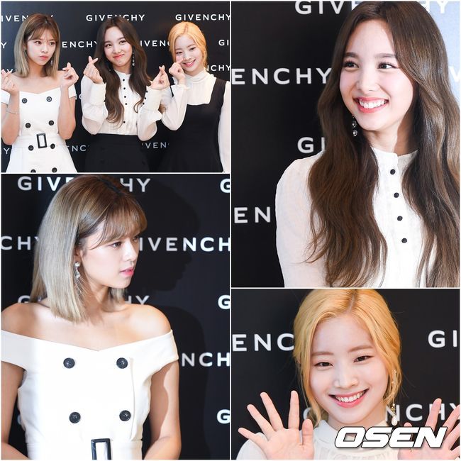 Girls group TWICE Nayeon, Jingyeon and Dahyun are posing at the event commemorating the official store of the brand Givenchy held at a store in Shinchon branch of Hyundai Department Store in Seoul on the morning of 7th.
