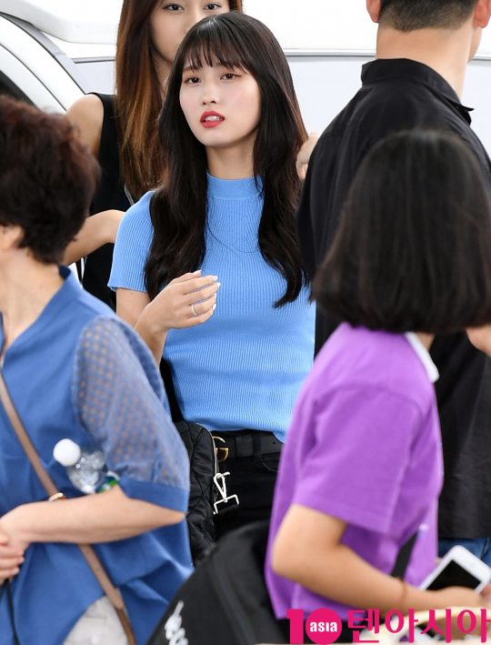 Girl group TWICE (Nayeon, Jinyeon, MOMO, Sana, Jihyo, Mina, Dahyun, Chae Young, TZUYU) MOMO departs through the International Airport on the afternoon of the 23rd to attend the TWICELAND Zone 2 in Jakarta concert.