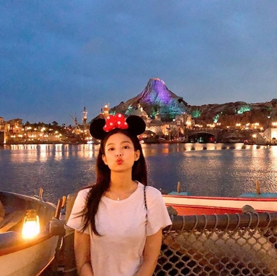 BLACKPINK member Jenny Kim showed off her cute appearance.Jenny Kim posted a picture on her Instagram on Thursday.In the photo, Jenny Kim looked at the camera wearing a Mickey Mouse headband, which gathered her lips and emanated a cute charm.The netizens who watched this showed various reactions such as cute and lovely, I am not a Disney princess and I am pretty even if I wear white tee.Meanwhile, BLACKPINK is staying in rest car Japan after finishing the Arena tour at Japan Chiba Makuhari Messe recently.