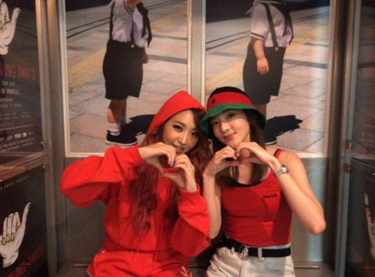 2NE1 (2NE1) Sandara Park and Minzy reunited.Sandara Park wrote on his personal SNS on the 12th, It is still a fun, cool and cute little brother Minki, he wrote, 2NE1 youngest line feat. watermelon bar fashion.In the photo released together, Sandara Park and Minzy from 2NE1 are wearing a red costume and wearing a hand heart.The friendship of 2NE1 members who are smiling at the camera is attracting attention, and Minzys beautiful beauty, which is clearly beautiful, also steals attention.Meanwhile, 2NE1, which remained a trio since Minzy left 2NE1 in April 2016, declared official disbanding in November of that year.Park did not renew his contract with YG, and now only Sandara Park and CL remain in YG and are soloing.