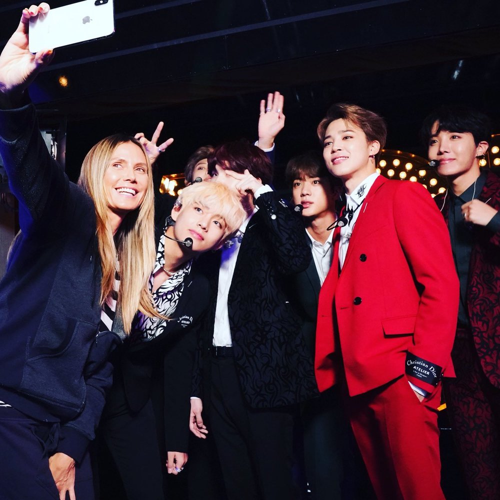 Heidi Klum, a famous German model, has released a photo taken with the group BTS (RM, Sugar, Jay Hop, Jean, Jimin, Vu and Jungguk).Heidi Klum said on September 12 (Korea time) on official Twitter Inc. #BTSonAGT happy night!Im so excited for tomorrow night Americas Got Talent! Im really looking forward to it. The photo, which was released together, shows Heidi Klum taking a picture in a friendly pose at the recording of the United States of Americas famous audition program Americas Got Talent with BTS members.Heidi Klum, who is smiling brightly with her cell phone, attracts attention.BTS will appear on Americans Got Talent, which airs on the United States of America NBC channel on Thursday morning.As a celebratory performer, the new repackage album LOVE YOURSELF Answer (Love Yourself Resolution Anser) will be released on August 24th, and the title song IDOL (Idol) will be performed.hwang hye-jin