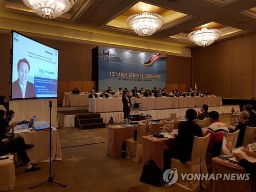 아시아수영연맹(AASF) 총회에서 내년 광주세계수영선수권대회를 소개하고 있다. [연합뉴스 자료사진]