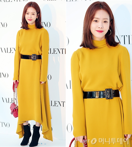 Actor Han Ji-min showed off her refreshing charm with a bright mustard-colored One Piece.Han Ji-min attended the opening event of the Italian brand Valentino SpA (VALENTINO) Kandy Stud Factory pop-up store held at Galleria Luxury Hall in Apgujeong, Gangnam-gu, Seoul on the afternoon of the 28th.On this day, Han Ji-min made a sophisticated look by matching a thick square belt to a long one piece with a lovely fall at the end of the skirt.Here, Han Ji-min wore a warm suede-based ankle boots and lightly lifted a clear red color chain bag to add points.Han Ji-min also handed her shoulder-length medium hair behind one ear, and featured rose gold ring earrings, and completed a lively look with clean eye makeup and clear hot pink lip.Meanwhile, Han Ji-min, actors Lee, Min Hyo-rin and Seo Hyun-jin attended the Valentino SpA Kandy Stud Factory Pop-up Store Open Event.