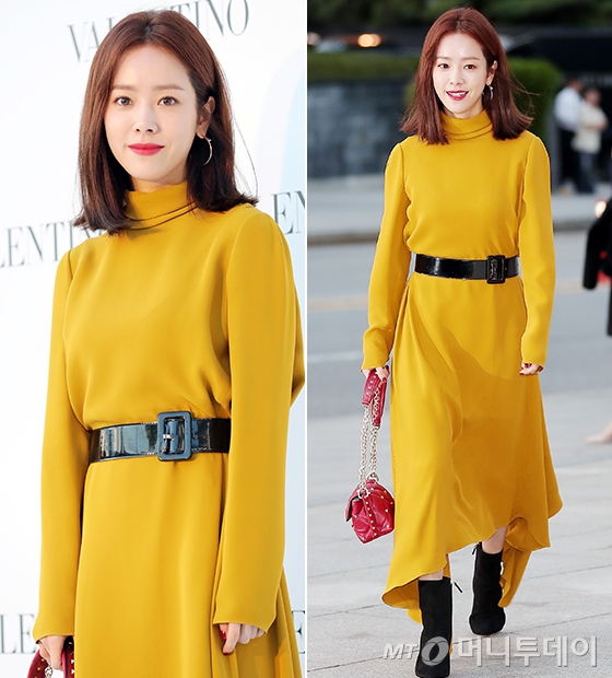 Actor Han Ji-min showed off her refreshing charm with a bright mustard-colored One Piece.Han Ji-min attended the opening event of the Italian brand Valentino SpA (VALENTINO) Kandy Stud Factory pop-up store held at Galleria Luxury Hall in Apgujeong, Gangnam-gu, Seoul on the afternoon of the 28th.On this day, Han Ji-min made a sophisticated look by matching a thick square belt to a long one piece with a lovely fall at the end of the skirt.Here, Han Ji-min wore a warm suede-based ankle boots and lightly lifted a clear red color chain bag to add points.Han Ji-min also handed her shoulder-length medium hair behind one ear, and featured rose gold ring earrings, and completed a lively look with clean eye makeup and clear hot pink lip.Meanwhile, Han Ji-min, actors Lee, Min Hyo-rin and Seo Hyun-jin attended the Valentino SpA Kandy Stud Factory Pop-up Store Open Event.