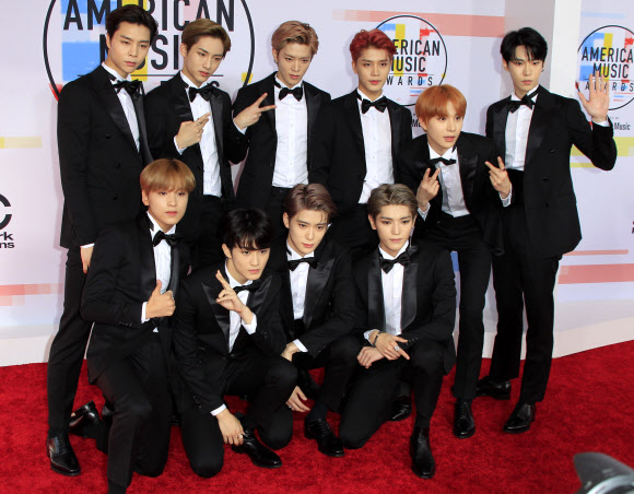 Group NCT 127 poses at the 2018 American Music Awards Red Carpet Event at the Microsoft Corporation Theater in Los Angeles, USA, on the 9th (local time).EPA Yonhap News