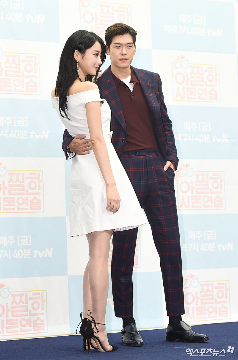 Kyungri and Austin River pose at the presentation of TVNs new entertainment program Sick Sadon Practice at Stanford Hotel in Sangam-dong, Seoul on the 12th.