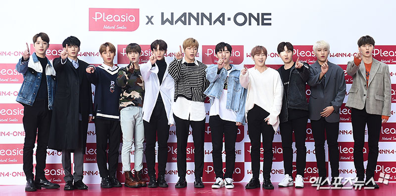 Wanna One poses at an event of a Naturalism dental care brand held at the headquarters of Amorepacific Corporation in Yongsan District, Seoul on the afternoon of the 13th.