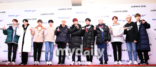 Group Wanna One poses at a Sports Clothing brand photo event held at Seoul Sejong University Ocean Hall on the afternoon of the 11th.The group Wanna One is preparing for a comeback with 111 = 1, which will be the first regular album and the last Wanna One activity on November 19th.