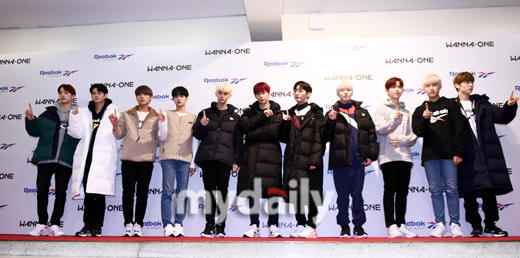 Group Wanna One is posing in a Sports clothing brand photo event held at Seoul Sejong University Ocean Hall on the afternoon of the 11th.The group Wanna One is preparing for a comeback with 111 = 1, which will be the first regular album and the last Wanna One activity on November 19th.