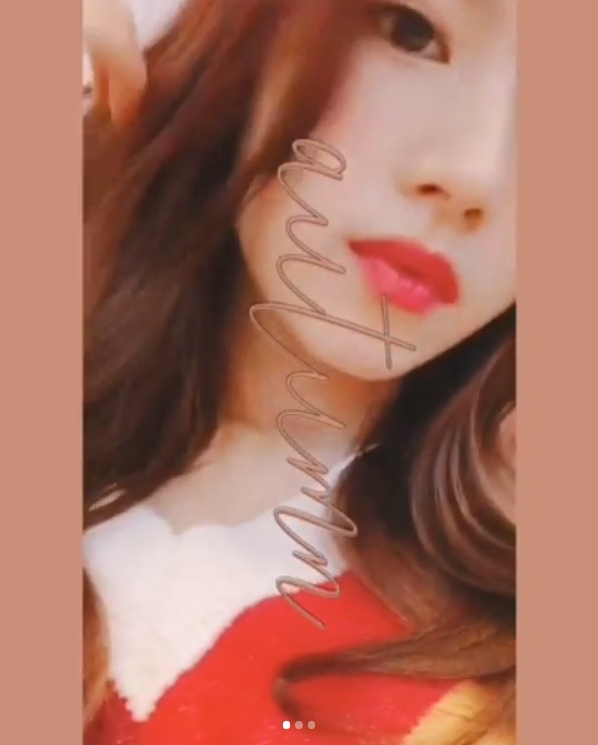 Group TWICE member Sana has given off a sexy charm.TWICE Official Instagram posted a video of Sanas photo shoot behind the scenes on November 11.In the video, Sana is touching her hair and radiating sensual eyes, which make her eyes resembling Sanas Cat and high nose look more prominent.Sanas white-oak skin also attracts Eye-catching.Fans who encountered video responded such as Pretty, Goddess and Its a bit seriously beautiful?delay stock