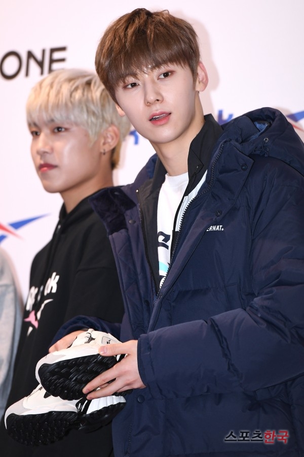 Hwang Min-hyun of the group Wanna One (Kang Daniel, Park Jihoon, Lee Dae-hwi, Kim Jae-hwan, Ong Sung-woo, Park Woo-jin, Ry Kwan-rin, Yoon Ji-sung, Hwang Min-hyun, Bae Jin-young and Ha Sung-woon) attends the Reebok Classic X Wanna One fan event held at the Ocean Hall of Sejong University in Gwangjin-gu, Seoul on the afternoon of the 11th.