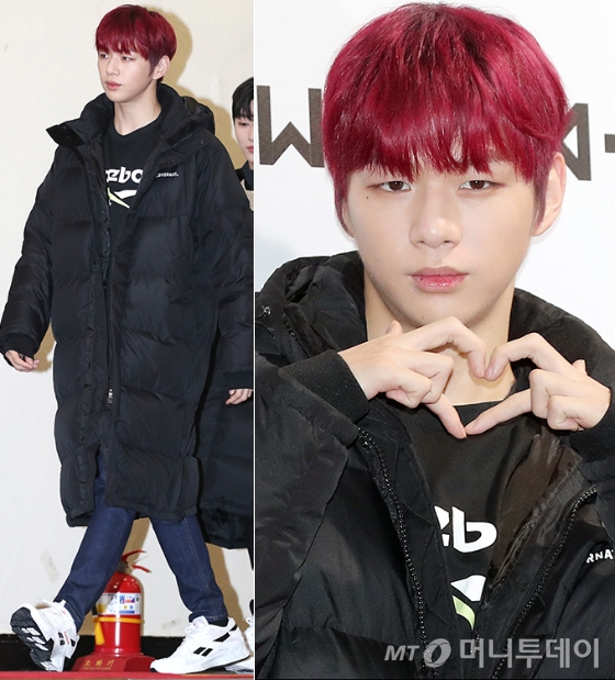 Group Wanna One Kang Daniel completed a stylish casual look with long padding and denim pants.Kang Daniel attended Reebok Classic X Wanna One Fan Event held at Sejong University Ocean Hall in Seoul Gwangjin-gu on the afternoon of the 11th.Kang Daniel appeared in a black T-shirt with a Reebok logo and slim fit denim pants.Here Kang Daniel wore a long black long padding down his knee, and a sporty atmosphere with Snickers with black and white color matches.Kang Daniel, who produced an intense red color hairstyle, attracted attention with various charms such as making a unique heart for fans.On the other hand, Wanna One will come back with his first full-length album 111 = 1 on the 19th.