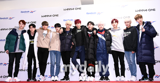 Group Wanna One poses at a Sports Clothing brand photo event held at Seoul Sejong University Ocean Hall on the afternoon of the 11th.The group Wanna One is preparing for a comeback with 111 = 1, which will be the first regular album and the last Wanna One activity on November 19th.