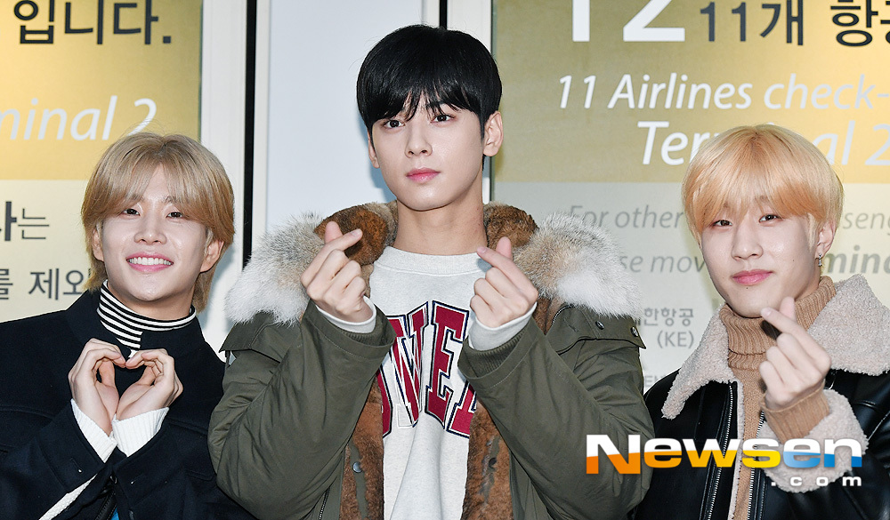 Singers Astro MJ, Cha Eun-woo and Chen Zhen pose for hearts before leaving for Japan via the Incheon International Airport on a schedule to attend the Shinhanryu Festival in Fukuoka Prefecture on the afternoon of December 3.useful stock