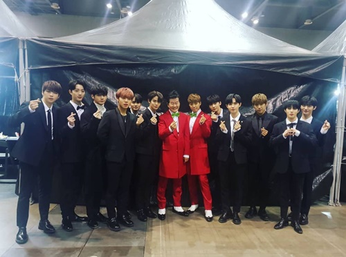 Wanna One, Tae Jin-ah, and Gangnam District, which are senior and junior members of the music industry, are united.On the afternoon of the 20th, Gangnam District posted a picture on his instagram with an article entitled #KOREAPOPULARMISOCAWARDS WITH #WANNAONE #Tae Jin-ah Now Start.In the photo, there are 11 members of Wanna One, Tae Jin-ah, and Gangnam District.Especially, their bright expression and lovely finger hearts give a warm heart.Also drawing attention is the contrast of Wanna Ones black suits and Tae Jin-ah, and the red costumes in Gangnam District.Meanwhile, Wanna One, Tae Jin-ah, and Gangnam District enjoyed the joy of winning the first Korean pop music awards ceremony.