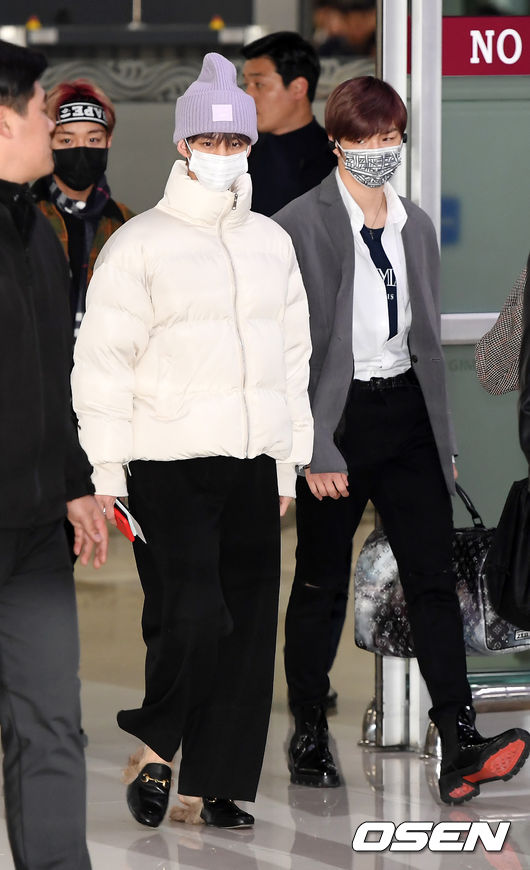 Wanna One Bae Jin Young and Kang Daniel are performing Entrance through Gimpo International Airport in Seoul Gangseo-gu after finishing fan signing and high touch events in Japan with their members.