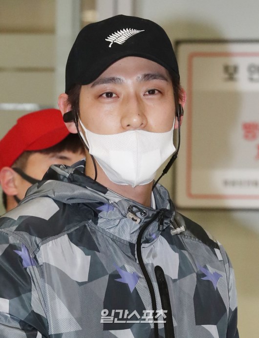 Yoon Park poses as he exits Arrival Point