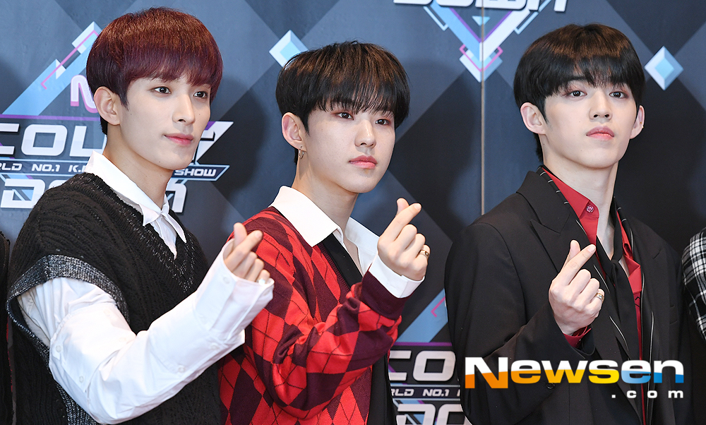 Singers Seventeen DK, Hosi and Scoops have photo time before attending Mnet M Countdown held at CJ ENM Center in Sangam-dong, Mapo-gu, Seoul on the afternoon of January 31.useful stock