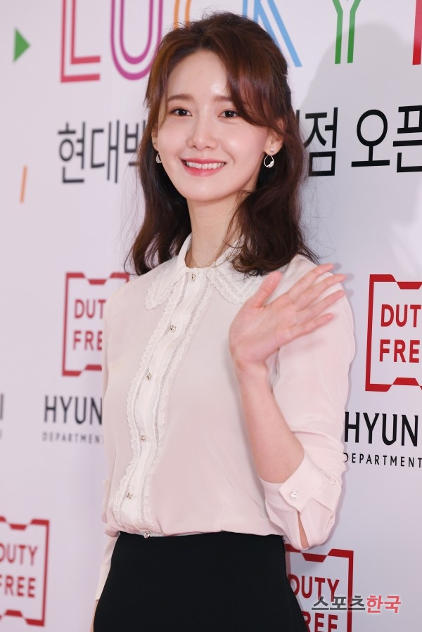 Im Yoon-ah is attending a photo event commemorating the 100th anniversary of the opening of Hyundai Department Store Duty Free Shop held at Hyundai Department Store Trade Center in Seoul on the 8th.