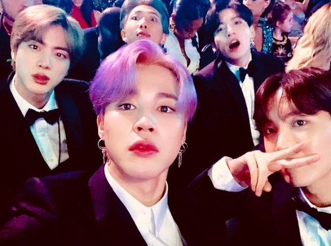 BTS was the first Korean to attend the 61st Grammy Awards held at the LA Staple Center in California on the 11th (Korea time).BTS has been attracting worldwide attention to the worlds best awards ceremony and the prestigious and conservative Grammy Awards, and member Ji Min has become the center of the topic with a wonderful purple hairstyle and a suit of Korean designer JayBaek Couture.The U.S. reaction was hot: In the unknown talk show Entertainment Tonight, Ji Mins English interview video, which turns the ball of Grammys entry to fans, was posted with Heart.Jimin attended the Grammy Awards from the red carpet, attracted attention with purple hair and bright smile, and focused on the local people with a witty expression, gestures and natural English during the BTS interview.By the world viewers who saw the BTS Ji Min on the screen, puple hair is so hot who is that? (Who is purple hair so hot?), and has produced trends in 16 countries including United States of America, France, Italy, and Korea and California.The notable point is that the Grammy Awards venue, LA, is one of 58 administrative areas in California and that JIMIN has been trended over one million throughout California, which is a figure that shows how hot the interest and response to BTS Jimin was at the Grammy venue.On the same day, BTS Ji Min was hit by a double slope.On the 11th, Ji Mins first self-titled song Promise set Koreas first record with a new record breaking 100 million streaming on the world music sharing site Sound Cloud.After the release, the record of famous rapper Drake was changed to double figures in 24 hours, bringing about the paralysis of sound cloud access immediately after the release, and it was reported by famous media around the world including North American media such as Billboard, Times, Forbes and Global News.In addition, Promise is the number one song in the nine countries in North America and Europe and the number one song in United States of America for seven days.It has a similar number of views to the song of Ariana Grande, the top song of Genius, which is ranked in the 6th week in the Romanized version and English version on the USs largest housekeeping site Genius chart.BTS, which set a record of being invited to all three awards in United States of America with the attendance of the dreamy Grammy Awards, revealed its aspiration to come back here, drawing more anticipation for the new album, which is known to be working on.In particular, after the release of his first self-titled song, Jimins formal solo sound source request, which has been recognized as a singer-songwriter and singer-songwriter, is continuing.Ji Min, a golden pig band BTS, who won the first place in the personal brand evaluation in January and opened the door of the new year with his own song gusts, is expected to be more active this year.