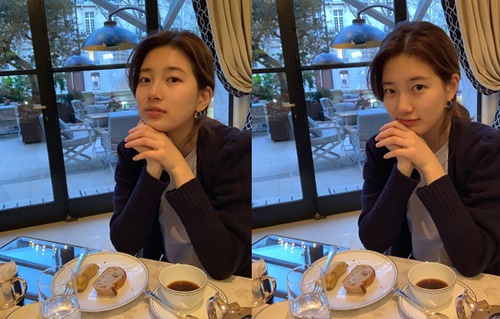 Singer and actor Bae Suzy has revealed his current status.On the 26th, Bae Suzy posted several photos through his instagram.In the open photo, Bae Suzy looks at the camera with a pale smile while eating coffee and bread.Especially, his pure and neat charm stands out and focuses attention.Meanwhile, Bae Suzy will appear on SBS Bond, which is scheduled to air in May.Bond is a drama about the process of a man involved in a civil-commodity passenger plane crash digging into a huge national corruption found in a concealed truth.