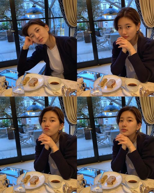 Singer and actor Bae Suzy has revealed her routine in Paris, France.Bae Suzy, who recently left for Paris to attend a fashion show, posted several photos on his instagram on the 26th.In the public photos, there are pictures of sitting on a bench in the street and posing and enjoying coffee at restaurants.The beauty of Bae Suzy, which shines even in the white tee, cardigan, and the gentle appearance without the toilet, catches the eye.Meanwhile, Bae Suzy appears in the drama Bae Bond, a drama about the process of digging up a huge national corruption found by a man involved in a civil passenger plane crash that is broadcasted in May.Bae Suzy Instagram