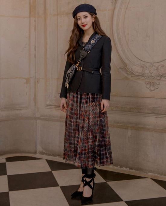Singer and actor Bae Suzy showed off her doll-like beauty at France Paris via several photos posted on social media on Wednesday.Bae Suzy attended the Dior 2019 A/W Collection at the France Paris Rodin Museum, which included photos of the scene.Bae Suzy, dressed in blue for both berets and coats, beamed as she stared at the camera.Bae Suzy is working as a solo singer and also working as an actor. In May, she will return to SBSs new drama Baega Bond.
