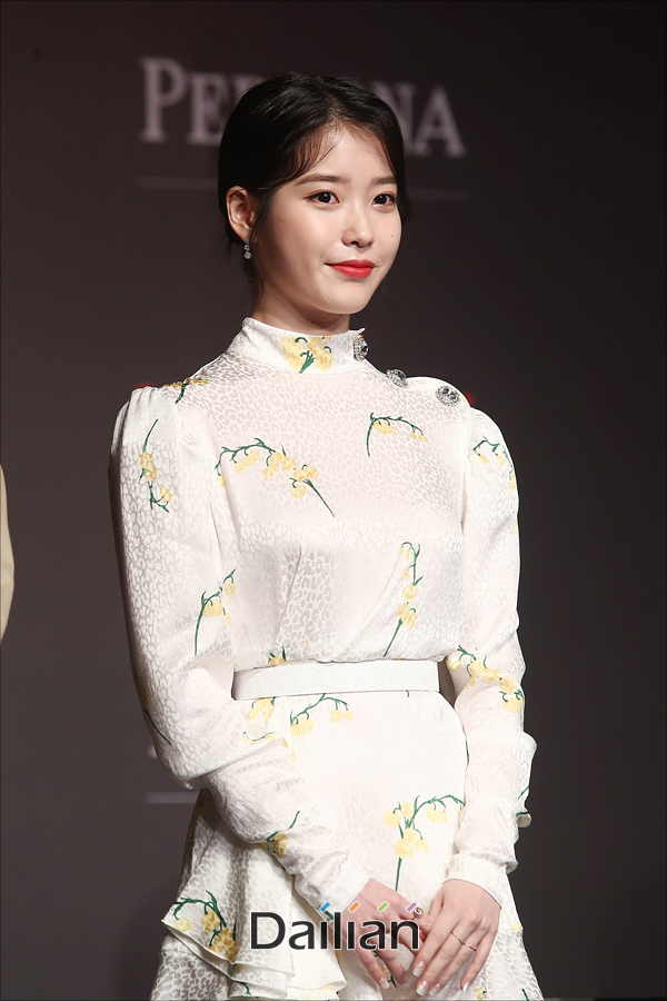 Singer and actor IU (Lee Ji-eun) has a report on the production of the Netflix original series Persona at the Conrad Hotel in Yeouido, Seoul on the morning of the 27th.