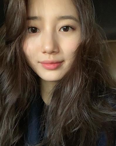 Singer and actor Bae Suzy showed off her beautiful beauty.Bae Suzy said on his SNS on the 8th, Hello, this is Bae Suzy.I have finished the contract with JYP, my agency that I have been with since my debut, and I have been with the new management forest from today. In the open photo, Bae Suzy is staring at the camera with a perfect sculpture beauty figure even in a non-toilet person.Especially, the super close self-portrait is flawless and transparent skin, and the lovely eyes make the hearts of male fans excited.Meanwhile, SBS Bond, starring Bae Suzy, tells the process of a man involved in a civil airliner crash digging into a national corruption.Bae Suzy will appear as the NIS black agent Go Hae-ri in Bond.In addition, Bae Suzy will join the main characters in the movie Baekdusan starring Lee Byung Hun and Ha Jung Woo as a major character.