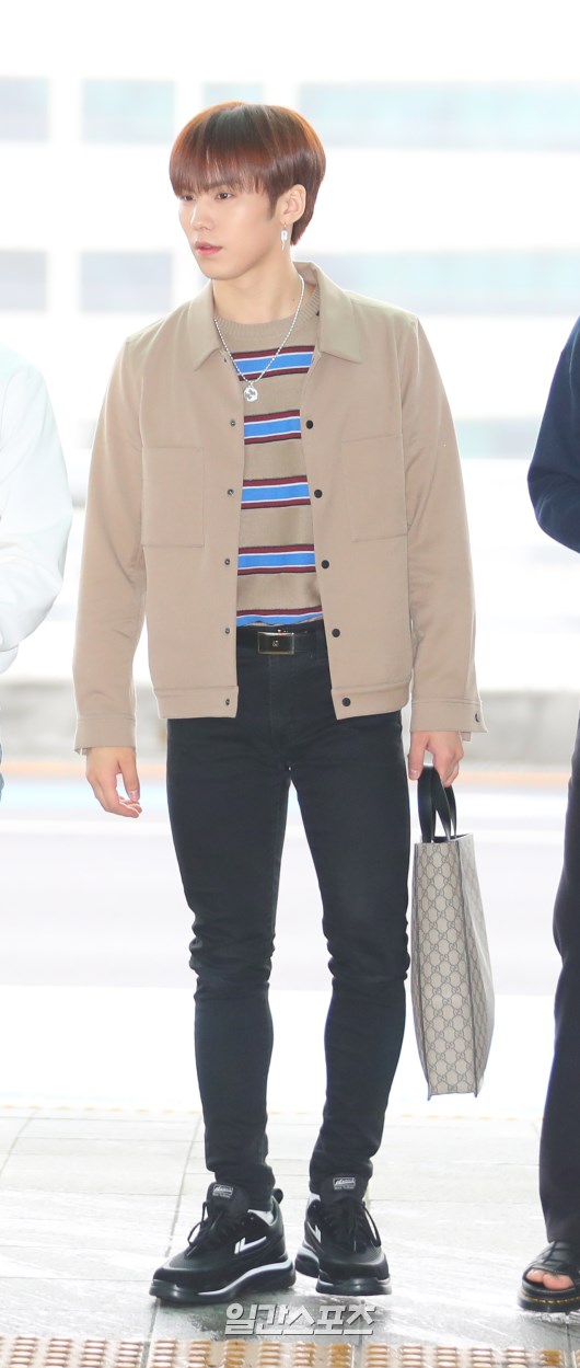 Rocky poses as he enters the departure hall.