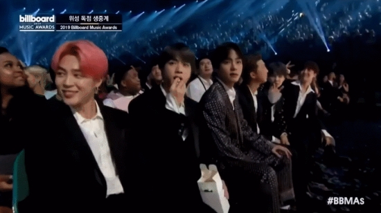 Group BTS won two gold medals at the 2019 Billboards Music Awards (hereinafter referred to as the Billboards Awards).He won the Top Group and Top Social The Artist category.BTS enjoyed the performance by sitting in the front row of The Artist seat at the Billboards Awards ceremony at the MGM Grand Garden Arena in Las Vegas, Nevada, USA on the morning of the 2nd (Korea time).Whenever he was caught on NBCs camera, he was relaxed enough to greet him lightly.BTS was also caught on screen at singer Kelly Clarksons Billboards awards opening.Members approached the camera at this time and enjoyed the stage of other singers with poses or light rhythms; other singers also demanded a photo shoot, referring to BTS.BTS responded with a smile.