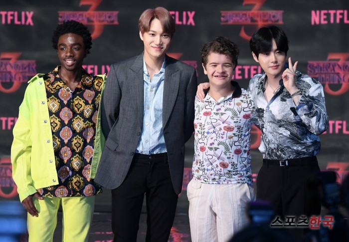 Caleb McLaughlin, Kai, Gayton Matarazo and Suho attend the Netflix Strange Story 3 red carpet held at Time Square in Yeongdeungpo, Seoul on the afternoon of the 20th.Netflix Strange Story 3 is a mystery thriller about the more bizarre and huge events in the town of Hawkins, Indiana, a year after the return of missing boy Will Byers.
