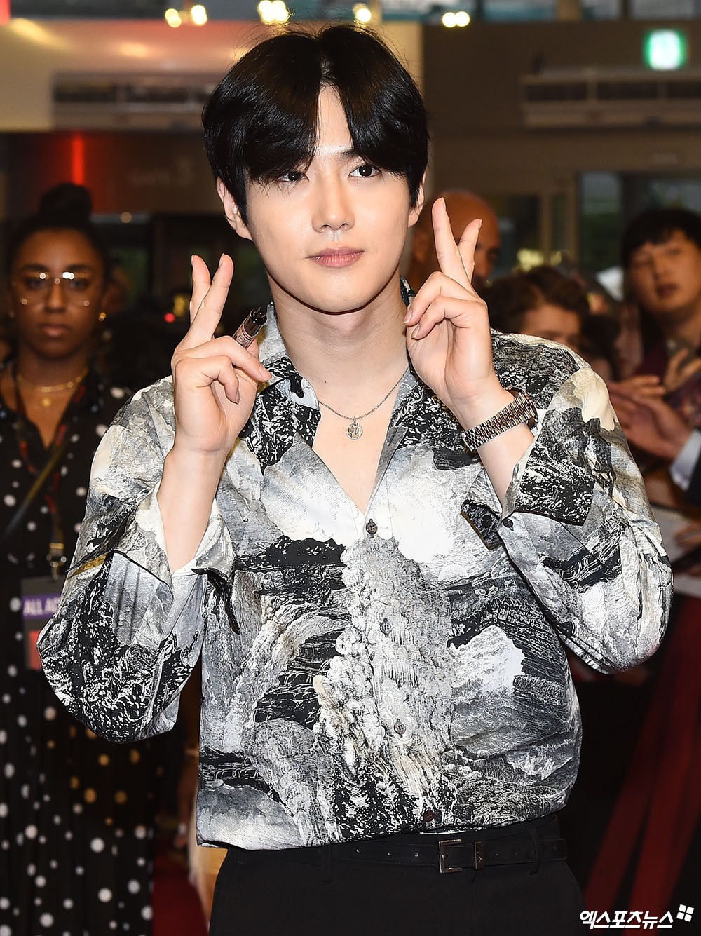 EXO Suho, who attended the red carpet event of Netflixs popular original series Queen Story 3 held at Time Square in Yeongdeungpo, Seoul on the afternoon of the 20th, is posing.