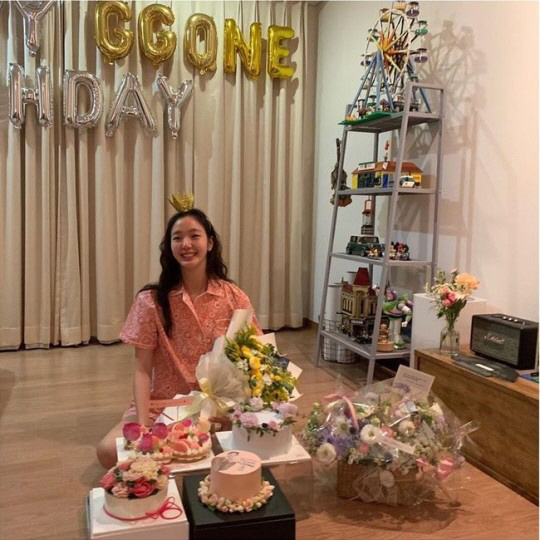 Photos of actor Kim Go-euns birthday party have been released.Kim Go-eun posted an article and a photo on the 3rd, Thank you!The photo shows Kim Go-euns birthday party on the 2nd, and Kim Go-eun, wearing a pink pajama, is smiling brightly.Many cakes and bouquets in front of Kim Go-eun add to the atmosphere of the birthday party, especially fellow actors Han Ji-min, Jung Ryeo-won and Son Dam-bi, who left a congratulatory comment saying Happy Birthday.Kim Go-eun was born on July 2, 1991. Kim Go-eun is preparing to appear in Kim Eun-sooks next film, The King: The Monarch of Eternity.