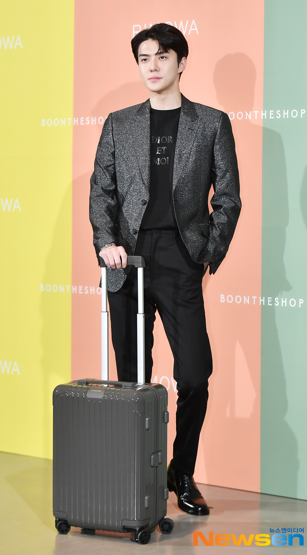 EXO Sehun attended the German premium luggage mother brand pop-up store event held at the Cheongdam-dong Bunder Shop in Gangnam-gu, Seoul on the afternoon of July 5Sehun is responding to the photo pose on the day.expressiveness