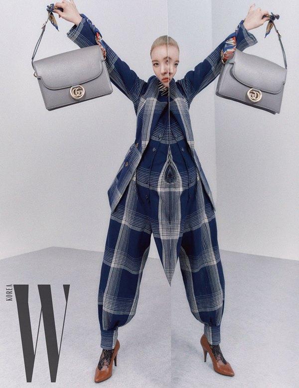 Gucci, an Italian luxury brand, released a picture with EXO Kai and Sunmi in the September issue of W. Korea.Kai fired her glamorous eyes in a magenta-colored jacket with prints and grey-colored vintage wide pants through a W. Man cover.In particular, in the picture, Kai showed ultra-face sneakers and menz luggage bags, which matched ivory-colored shirts, dark gray pants, gill pattern knits and silk pants in the wool crepe coat and were newly released in the fall/winter 2019 collection.In addition, Sunmi matched the white-multicolored hound tooth jacket and wrap skirt with black velvet pockets, and at the same time attracted attention with a dynamic gesture.In addition, she featured a blue-white jacket and jumpsuit from the drawing detail of the 2019 Autumn/Winter Collection, asymmetrical Draftings black jacket and skirt, with a grey leather medium shoulder bag featuring double G-ring detailing and a Sylvie 1969 bag featuring slim gold chain detailing, decorating the picture with her own delicate pose.