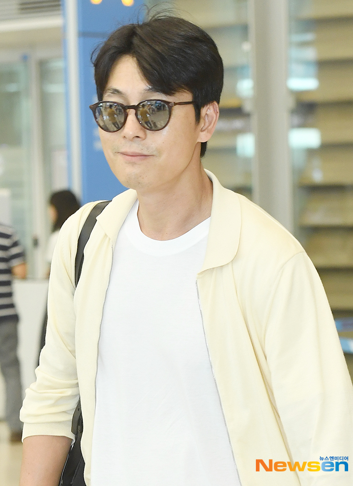 Actor Jung Woo-sung is performing Entrance through Incheon International Airport in Unseo-dong, Jung-gu, Incheon after finishing his overseas schedule on the afternoon of August 27th.useful stock