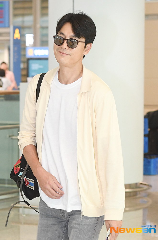 Actor Jung Woo-sung is performing Entrance through Incheon International Airport in Unseo-dong, Jung-gu, Incheon after finishing his overseas schedule on the afternoon of August 27th.useful stock